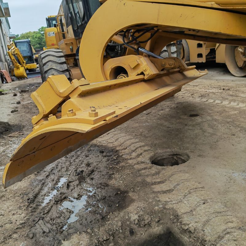 Escavatore usato levigatore Caterpillar CAT140K macchina stradale giapponese di seconda mano motore del trattore in buone condizioni